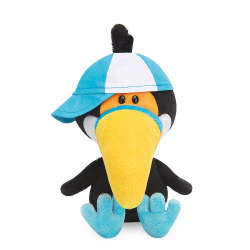 Тукан Току в кепке